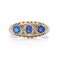 18kt gold three - stone sapphire ring - image 4