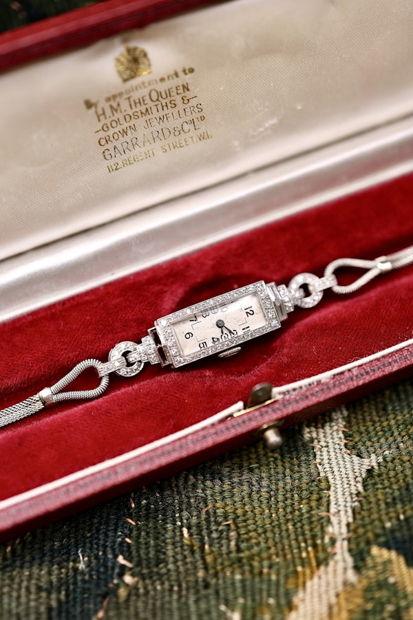 A very fine oblong "Art Deco" Diamond set Cocktail Watch in Platinum & 18ct White Gold (tested) with Diamond Step shoulders. Circa 1930 - image 1