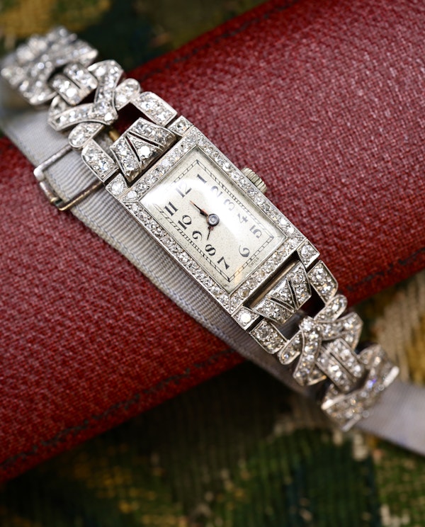 A very fine Platinum (tested), Art Deco Diamond Cocktail Watch with a Diamond set Half-Bracelet. Circa 1930. - image 1