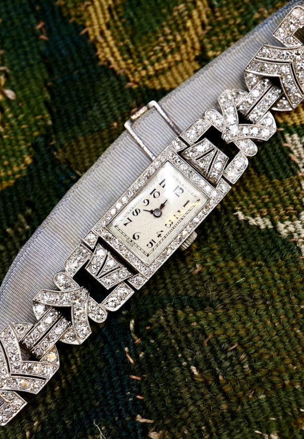 A very fine Platinum (tested), Art Deco Diamond Cocktail Watch with a Diamond set Half-Bracelet. Circa 1930. - image 3