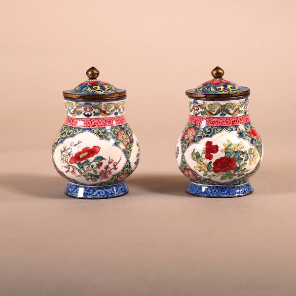 A pair of early Chinese Qianlong Canton enamel pomode pots and covers - image 1