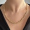 18ct Reef Knot Neckchain 19.5″ SADDINGTONS JEWELLERY- STAND 375 - image 1