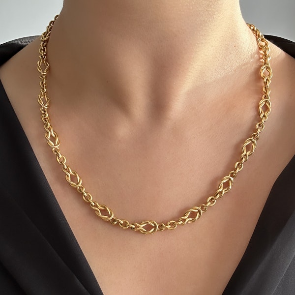 18ct Reef Knot Neckchain 19.5″ SADDINGTONS JEWELLERY- STAND 375 - image 1