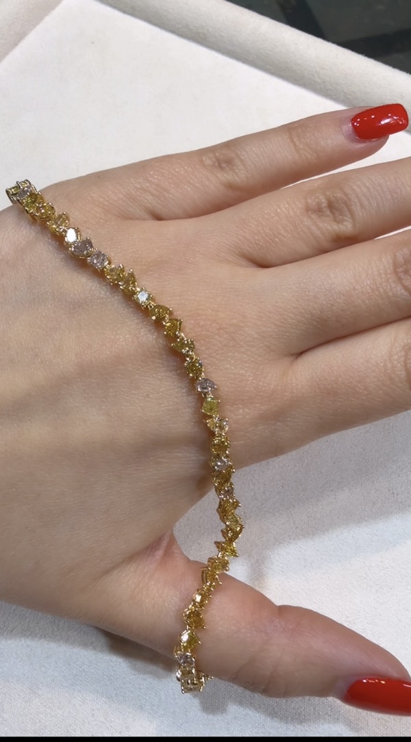 Stunning Fancy color diamonds, pink & yellow diamond tennis bracelet - image 1