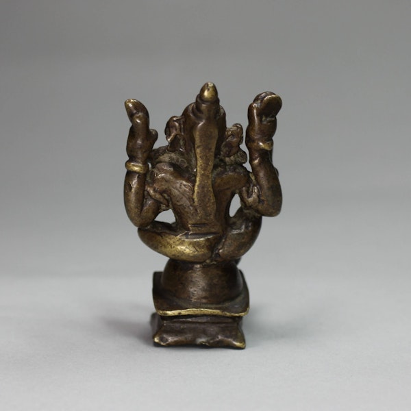 Indian miniature bronze of a seated four-armed figure, mid-19th century - image 2