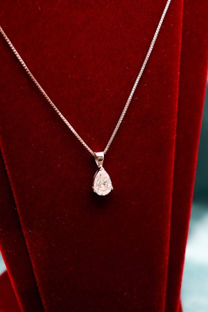 Downstairs at Grays: A very fine Pear Shaped Diamond Pendant, independently assessed as being of 1.81 Carats (weighed), G Colour and SI Clarity, on an 18 Carat (marked) White Gold Chain.