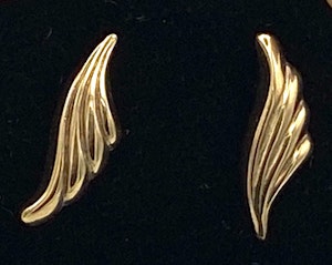 Gold earrings in the shape of a wing