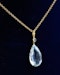 Downstairs At Grays: A fine 18ct. (tested), Yellow Gold  Pear Shaped Aquamarine Pendant, with Seed Pearl Bail. Circa 1905. - image 1