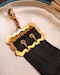 Downstairs at Grays: A very fine 9ct Yellow Gold Gentleman's Waistcoat Fob, a buckle design with black silk ribbon, stamped JG&S, Hallmarked Birmingham, 1909 - image 2