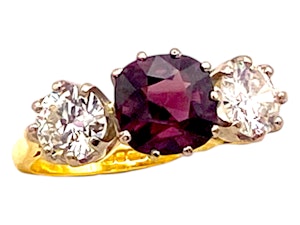 Natural red spinel and two diamonds three stone ring