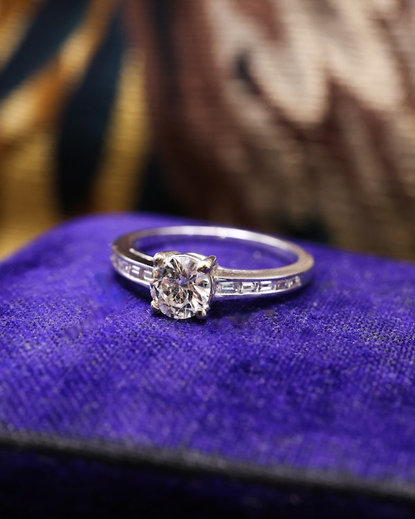 Downstairs at Grays: A very fine 18 ct White Gold Diamond  Solitaire Ring, 0.66 Carats Approximately, with shoulder settings of 0.18 Carats (stamped) of Modified Step Cut Diamonds.  Preowned - image 6