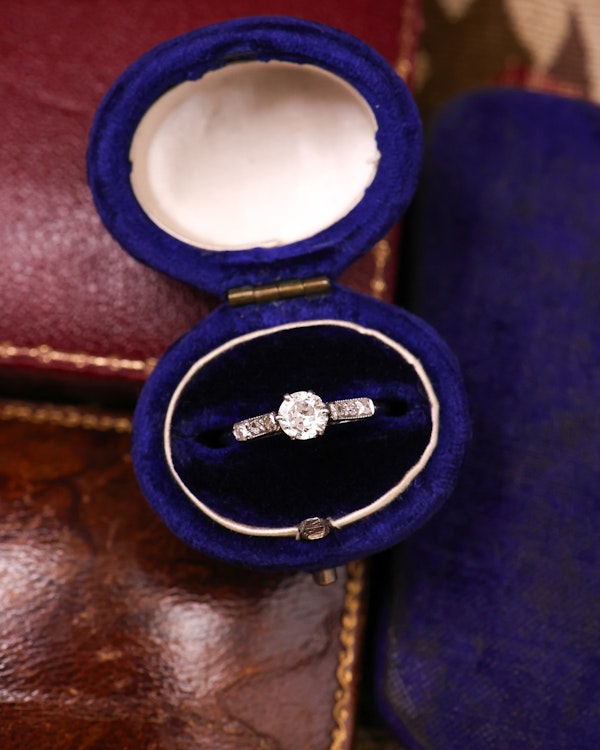 A very fine Platinum (marked) Diamond Solitaire Ring, centrally "Raised Claw Set" with one "Old Round Cut" Diamond of approximately 0.35 Carats. Circa 1925 - image 1