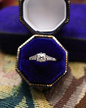 Downstairs at Grays: A very fine 18ct Yellow Gold & Platinum 0.50 Carat Old Cushion Cut  Diamond Solitaire Ring. Circa 1920