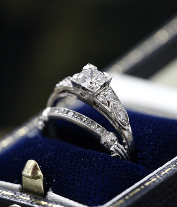A finely worked Platinum, Iridium & Diamond Engagement Ring with matching "Quarter" Eternity Ring Circa 1935 - image 1