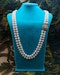 A very fine 18ct Yellow Gold  "Kutchinsky"(Signed), Double Stranded Akoya , Cultured Pearl Necklace, with a Clasp, set throughout with Burma Untreated Rubies & Diamonds. English. Circa 1950 - image 1