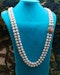 A very fine 18ct Yellow Gold  "Kutchinsky"(Signed), Double Stranded Akoya , Cultured Pearl Necklace, with a Clasp, set throughout with Burma Untreated Rubies & Diamonds. English. Circa 1950 - image 2