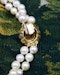 A very fine 18ct Yellow Gold  "Kutchinsky"(Signed), Double Stranded Akoya , Cultured Pearl Necklace, with a Clasp, set throughout with Burma Untreated Rubies & Diamonds. English. Circa 1950 - image 5
