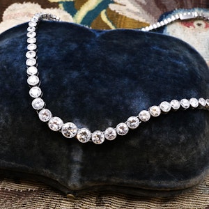Downstairs at Grays: A very fine Diamond Riviere Necklace, mounted in Platinum, Circa 1945