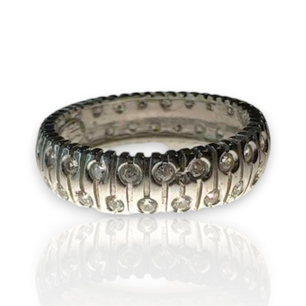 An elegant Flush-Set Diamond Band in 18k White Gold - image 4