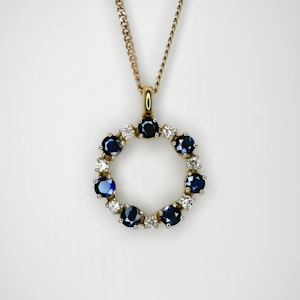 Circular Diamond Sapphire Pendant - Saddingtons Jewellery Stand 375