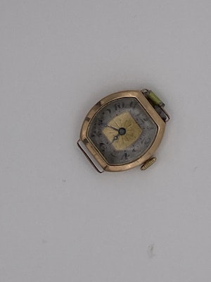 Edwardian 9 ct. rose gold wrist watch head with enamel dial in working order