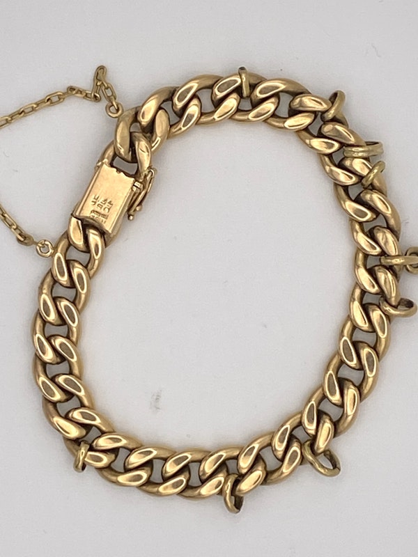 Heavy 18 ct. gold flat curb bracelet with rings fitted for charms suspension. 63 grams weight - image 2
