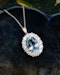 A fine 18 ct. White & Yellow Gold (tested) Oval Aquamarine and Diamond Cluster Pendant. Mid - Late 20th Century. - image 1