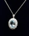 A fine 18 ct. White & Yellow Gold (tested) Oval Aquamarine and Diamond Cluster Pendant. Mid - Late 20th Century. - image 3