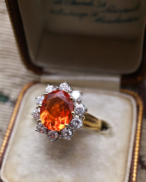 A very fine 18 Carat Yellow & White Gold Oval Fire Opal and Diamond Cluster Ring. London Hallmarks. Circa 1993. - image 1