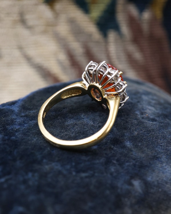 A very fine 18 Carat Yellow & White Gold Oval Fire Opal and Diamond Cluster Ring. London Hallmarks. Circa 1993. - image 5