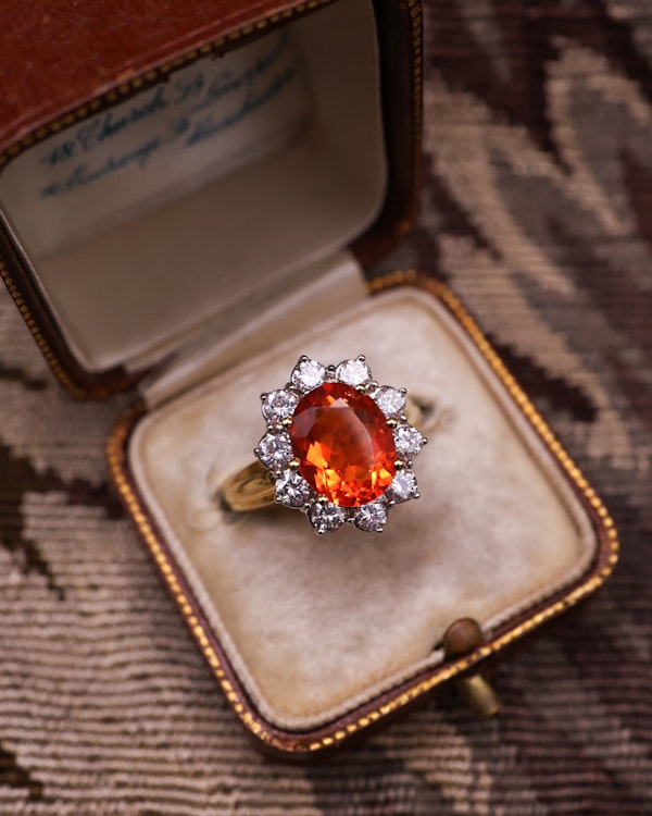 A very fine 18 Carat Yellow & White Gold Oval Fire Opal and Diamond Cluster Ring. London Hallmarks. Circa 1993. - image 4