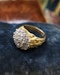 Downstairs at Grays: A Very Fine 18 Carat Yellow & White Gold (stamped), Diamond Cluster Ring, with an Abstract Bark Design to each Shoulder. Circa 1970. - image 1