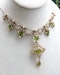 Downstairs at Grays, an Antique Peridot & Seed Pearl Festoon La Belle Époque Necklace with a matching Quatrefoil style detachable Pendant/Brooch in 15 Carat Yellow Gold, English, Circa 1900 - image 6