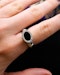 Downstairs at Grays: An 18ct (marked) Brushed White Gold Plaque Ring, with Oval Black Onyx, surrounded by a gallery of Single Cut Diamonds. Circa 1970 - image 3
