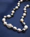 Downstairs at Grays: A Beautiful Dark and Light Grey to White Orient Graduated Cultured Pearl Necklace with an 18ct. White Gold (stamped), Spherical Clasp. Pre-Owned Circa 1990 - image 3