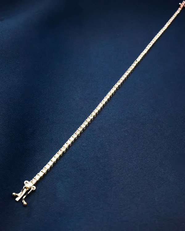 Downstairs at Grays: One very fine Diamond Line Bracelet set in 18ct. White Gold, assessed as approximately 2.25 Carats (un-weighed) and of I- J Colour and VS - SI Clarity. Pre-owned. - image 3