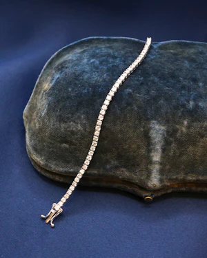 Downstairs at Grays: One very fine Diamond Line Bracelet set in 18ct. White Gold, assessed as approximately 2.25 Carats (un-weighed) and of I- J Colour and VS - SI Clarity. Pre-owned.