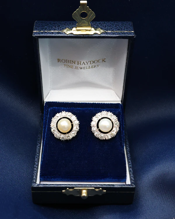 Downstairs at Grays: A fine pair of Natural Pearl and Old European Cut Diamond Cluster Earrings in Platinum & 18ct Gold (tested), Mounts. Circa 1930. - image 1