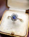 Downstairs at Grays: Yellow Gold (High Carat tested), Small Oval Sapphire & Diamond Cluster Ring, Circa 1920 - image 2