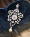 Downstairs at Grays: A High Carat Yellow Gold, Silver Tipped Foliate Pendant, set with Victorian paste stones and one Drop Cultured Pearl. Circa 1890. - image 1