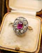 Downstairs at Grays: Natural "Siamese" Oval Ruby and Diamond Cluster Ring Circa 1910 - image 2