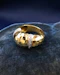 Downstairs at Grays: A very hammered 18ct Yellow Gold & Platinum (marked) Ring, with two cordons in Platinum, each set with ten Diamonds (20 in total). Continental. Circa 1960 - image 1