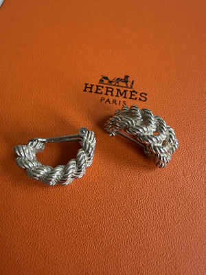 Hermes sterling silver clip earrings