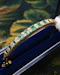 A very fine 15 ct Yellow Gold (tested), 2.20 Carat Colombian Emerald & Diamond Half Hinged Bangle. English Circa 1900. - image 2