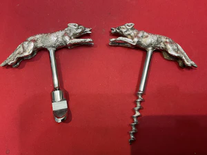 Antique silver corkscrew & bottle opener as running fox