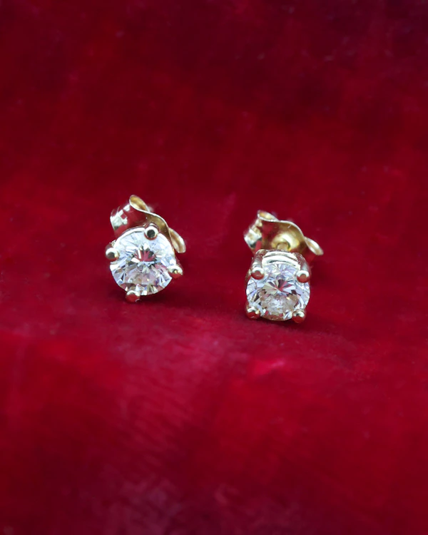 A fine pair of 14 carat Yellow Gold, Diamond Stud Earrings, Preowned. - image 1