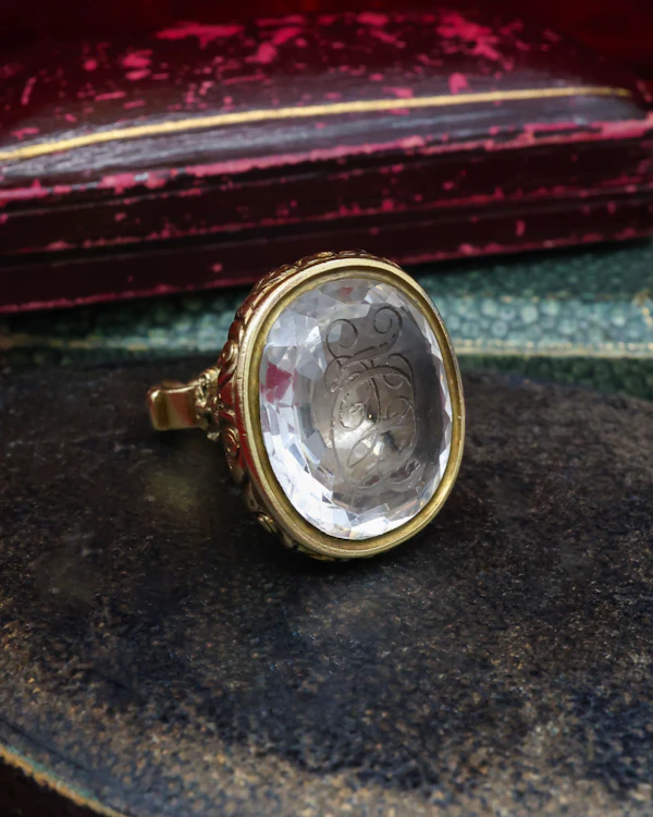 A 15 ct. (tested),Yellow Gold Seal in a detailed urn design and a Rock Crystal intaglio with facets to the edges and the initials H.J.B .  English Circa 1830 - image 1