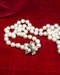 A fine Yellow Gold & Strung Cultured Pearl Necklace, set with four Round Cut Natural Sapphires (0.40 carats) and eighty three Oval and Near Shaped Cultured Pearls. Circa 1960 - image 2