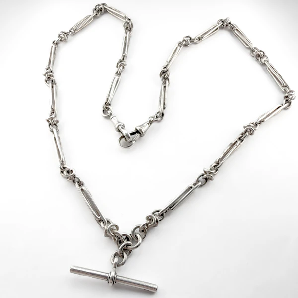 Edwardian 25.5″ Stylised Knot & Trombone Link Albert Chain - Saddingtons Jewellery Stand 375 - image 3