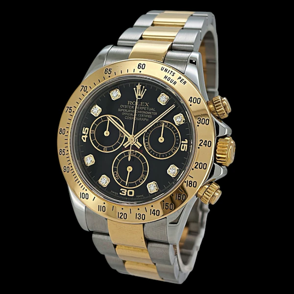 ROLEX DAYTONA FACTORY BLACK DIAMOND DIAL SS/YELLOW GOLD FULL SET UK WATCH 2005 - 116523 - image 1